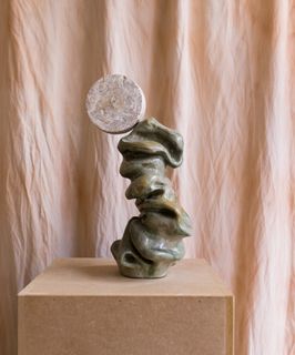 1.Iron glaze stoneware sculpture with marbled disc